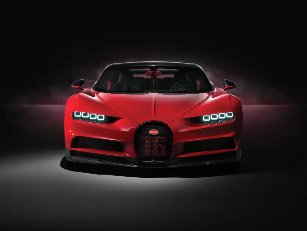 A $3.5M Bugatti Chiron hypercar delivery in London’s Mayfair and Knightsbridge stops traffic, drawing hundreds to see its rare carbon fiber design