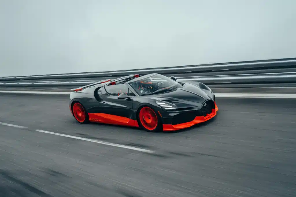 This Bugatti was made for sunshine but someone took it out with a umbrella instead