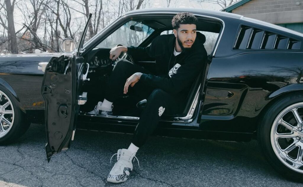 Jayson Tatum owns a vintage custom Ford Mustang with JT branding and 1968 Ford Mustang styling. This custom Mustang is a true reflection of his style