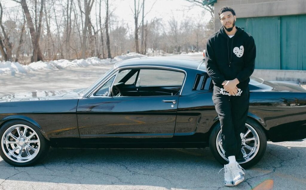 Jayson Tatum owns a vintage custom Ford Mustang with JT branding and 1968 Ford Mustang styling. This custom Mustang is a true reflection of his style