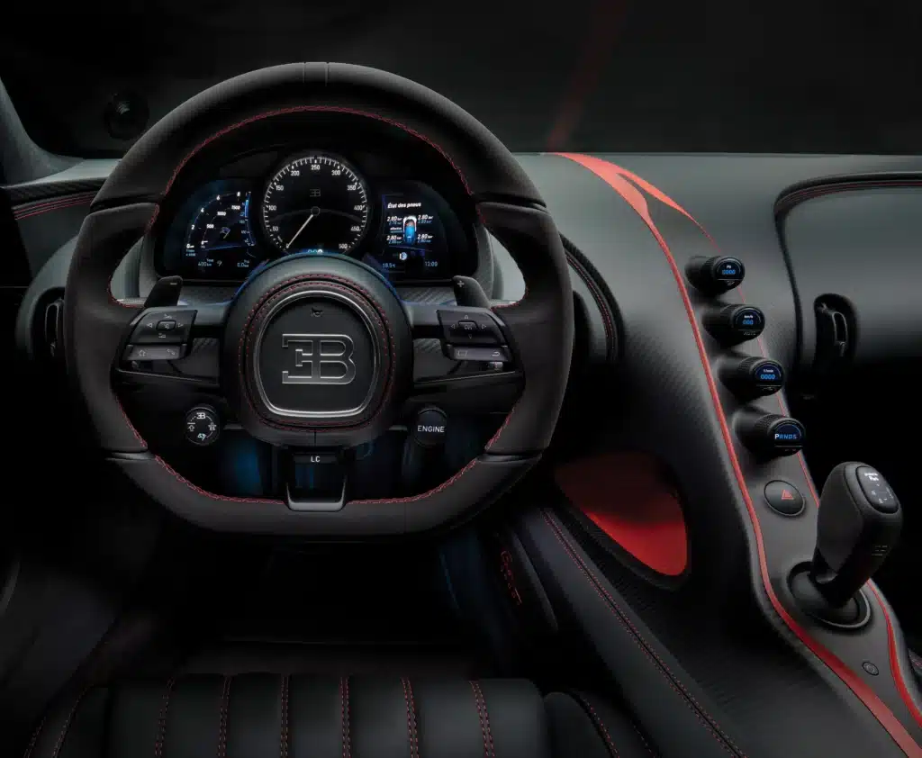 A $3.5M Bugatti Chiron hypercar delivery in London’s Mayfair and Knightsbridge stops traffic, drawing hundreds to see its rare carbon fiber design
