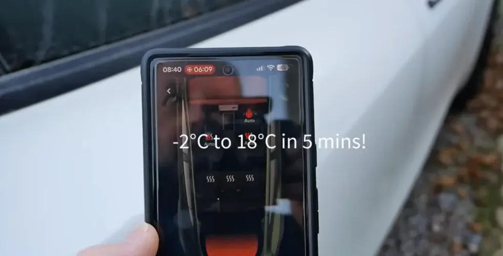 Man with frozen Tesla Model Y sees how quickly he can get the car defrosted and working with pre-conditioning in freezing temperatures