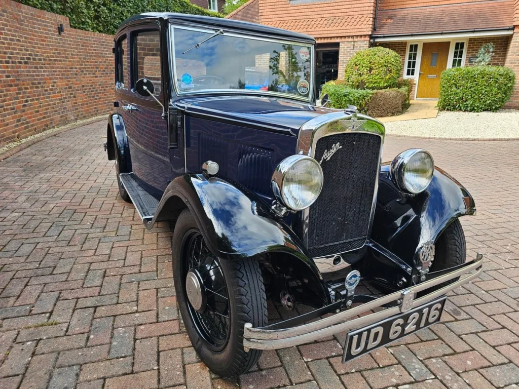 A Queensland couple uncovered an incredible beach car find, a buried 1930s Austin, on an anniversary stroll - a pre-WWII time capsule swallowed by sand