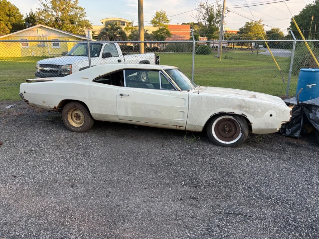 Two 1968 Dodge Charger muscle cars found in a South Carolina barn after decades and you get to choose which one lives