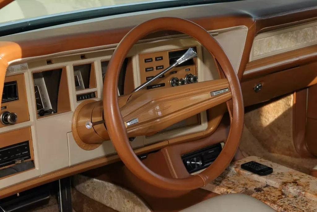 This 1973 Lincoln Continental was transformed into a chrome-heavy custom with a real granite interior and a massive 460 V8