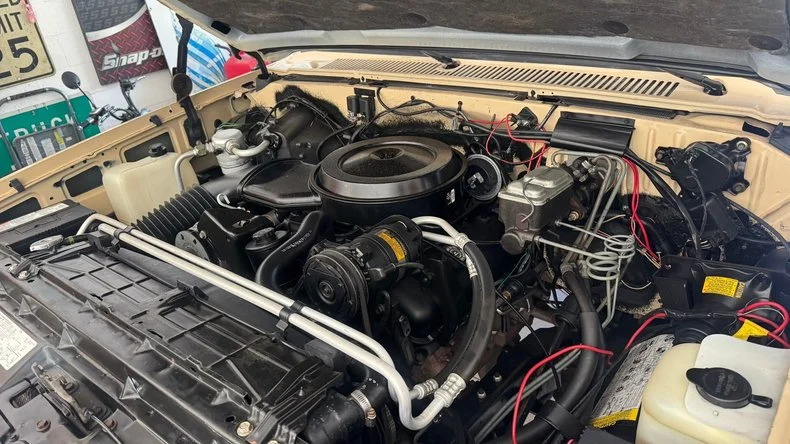 A 1988 Chevy K3500 Silverado with just 55 miles sold for $100,000, sparking debate over whether untouched originality beats modern truck tech