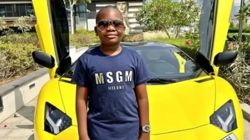 The 'world's youngest millionaire' loves posing in front of his supercar fleet 2008-Tesla-Roadster-Front-View Kentucky License