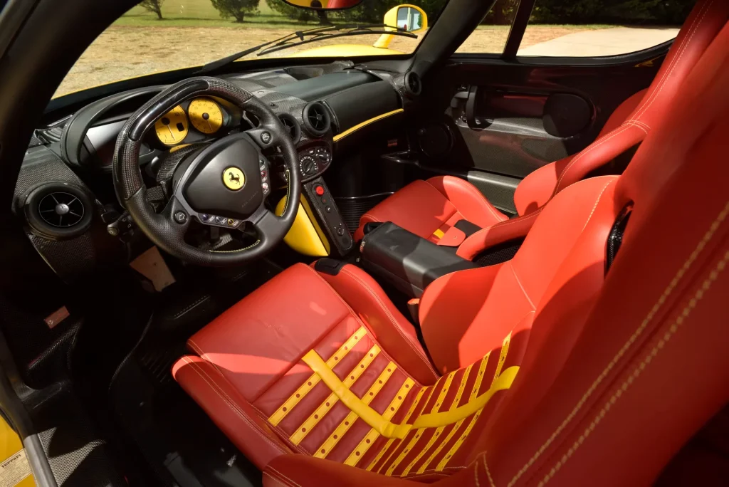 A yellow Ferrari Enzo  supercar just shattered expectations by selling for a record $17,900,000 at auction