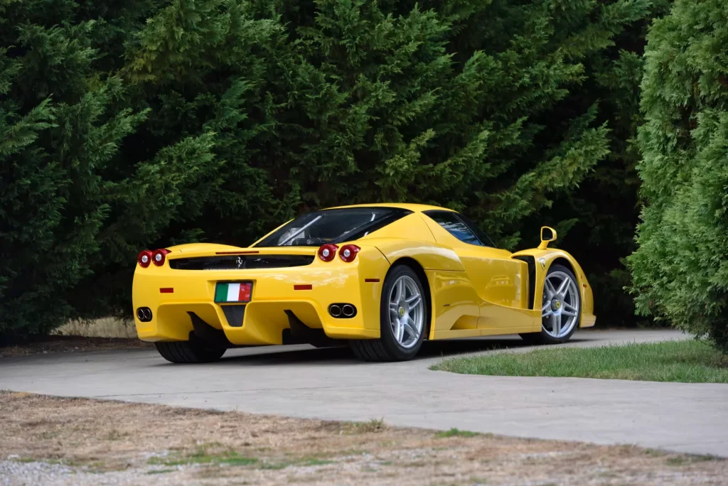 A yellow Ferrari Enzo  supercar just shattered expectations by selling for a record $17,900,000 at auction