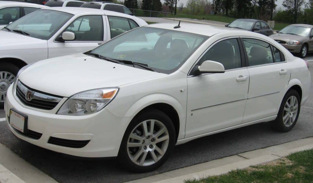 Driver left baffled by purpose of strangely shaped hole in 2008 Saturn Aura XE’s cupholder