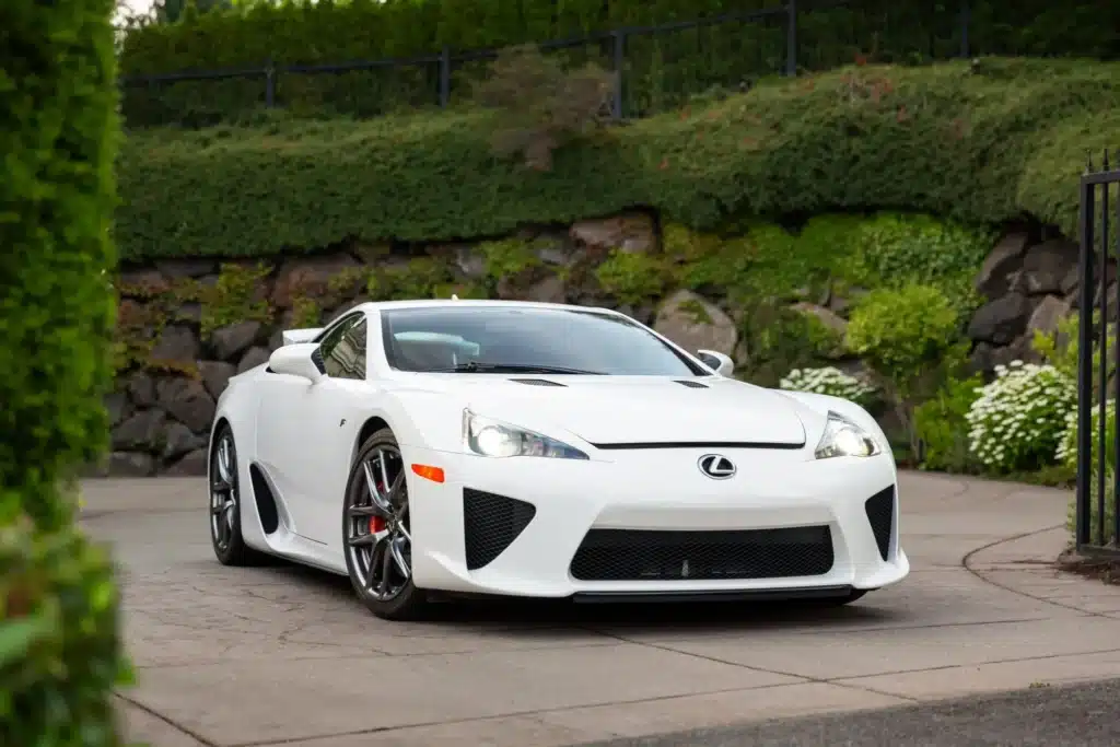 A Lexus LFA with high mileage is attracting $800,000 in a supercar auction, reflecting strong demand for this rare Japanese performance car