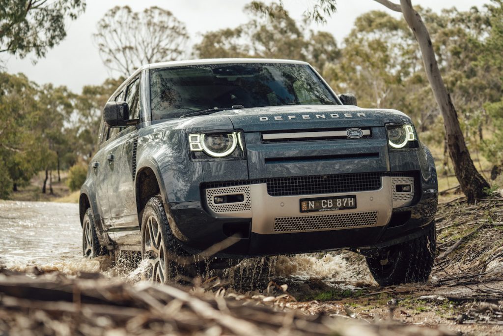 Land Rover Defender 4x4 driving off-road