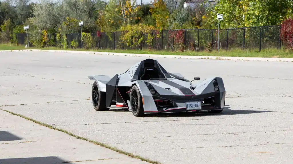 Canadian who got the perfect license plate for Nemesis R1 racecar he built tells us it's working and cops leave him be