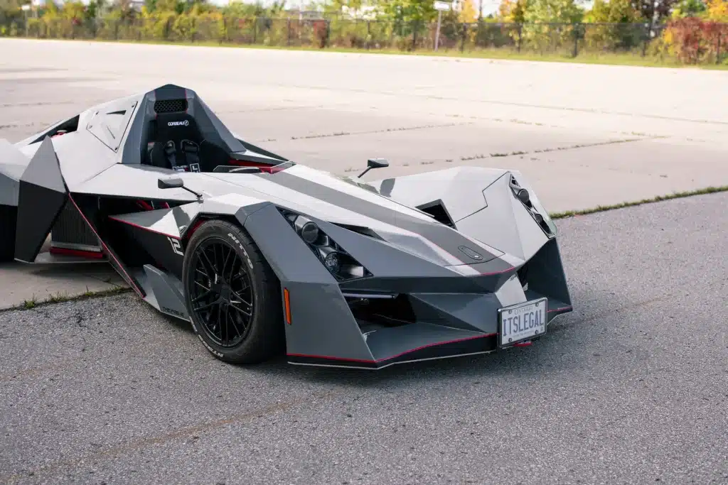 Canadian who got the perfect license plate for Nemesis R1 racecar he built tells us it's working and cops leave him be