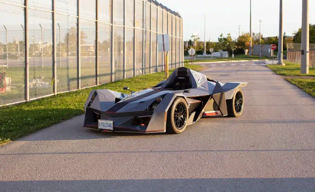Canadian who got the perfect license plate for Nemesis R1 racecar he built tells us it's working and cops leave him be
