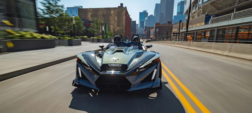 The 2026 Polaris Slingshot Signature Edition arrives with Golden Steel iridescent paint and upgraded 700-watt audio but no performance changes