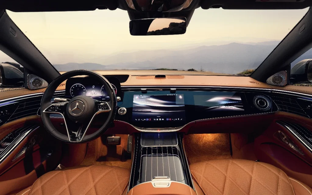 The 2027 Mercedes-Maybach S-Class luxury car just dropped with a V12, a superscreen and cupholders built exclusively for silver-plated flutes