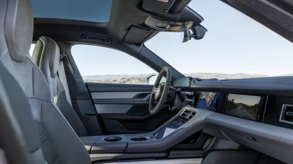 Porsche Taycan named EV of the Year for 2025 by Car and Driver, standing out as the leading electric sports sedan in a group of 24 competitors