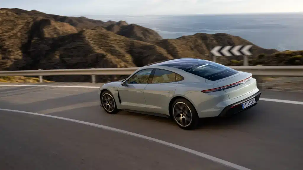 Porsche Taycan named EV of the Year for 2025 by Car and Driver, standing out as the leading electric sports sedan in a group of 24 competitors