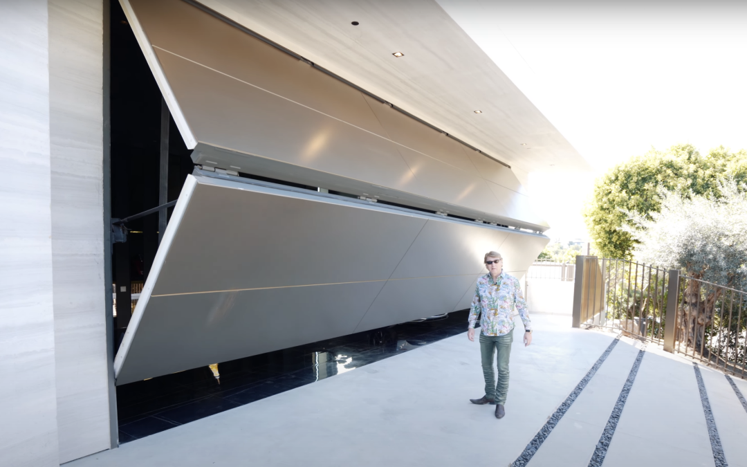Mega-mansion’s $350,000 garage door costs more than the Ferrari inside