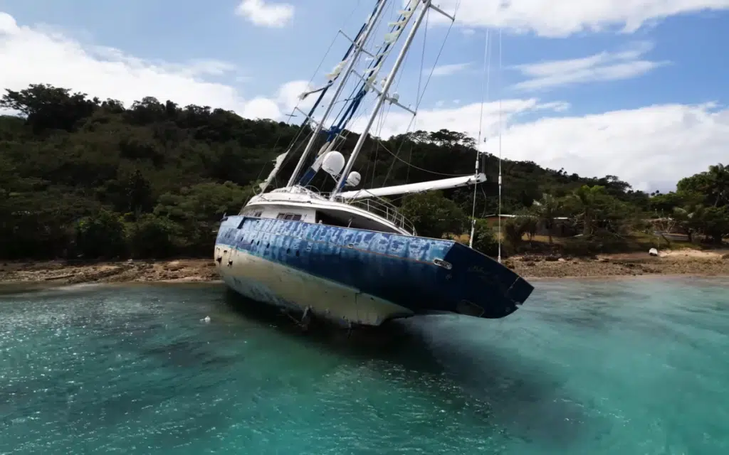 50-meter superyacht has been stuck on a reef since 2015 and locals are doing everything they can to salvage it