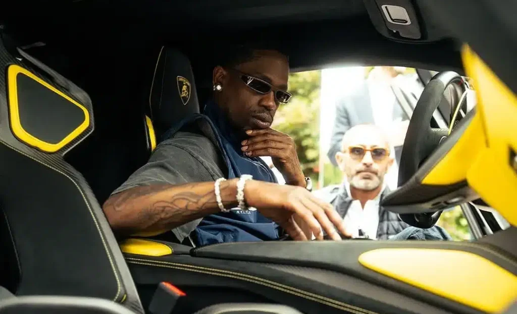 Travis Scott previewed the Lamborghini Fenomeno hybrid V12 at Monterey Car Week 2025, joining the debut of one of Lamborghini’s rarest supercars