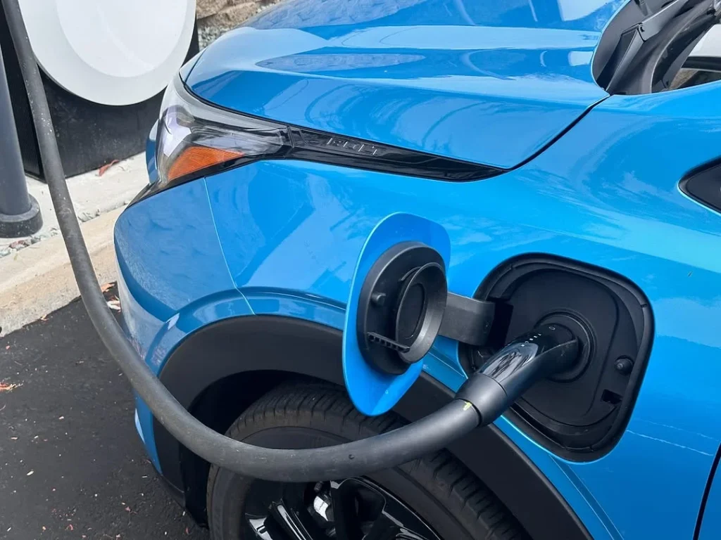 The 2027 Chevy Bolt EV was seen charging in California with no camouflage, as GM confirms EV charging upgrades and new battery tech