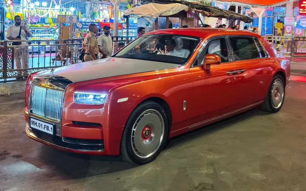 Rolls-Royce Phantom VIII Extended luxury car finished in custom saffron-orange