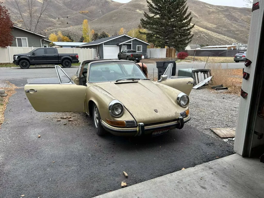After 31 years under a Christmas tree this abandoned Porsche 911 sports car gets a holiday miracle