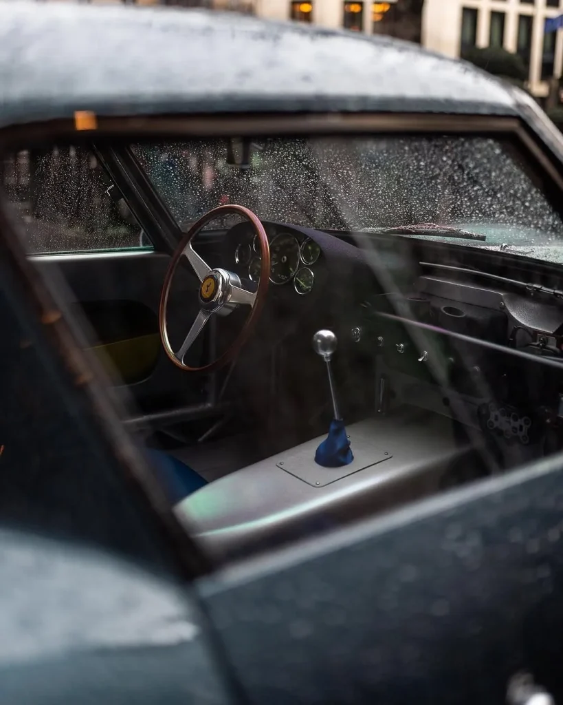 A street photo of a Ferrari supercar sparked chaos online after viewers realized the drenched coupe in the frame wasn’t nearly as ordinary as it seemed