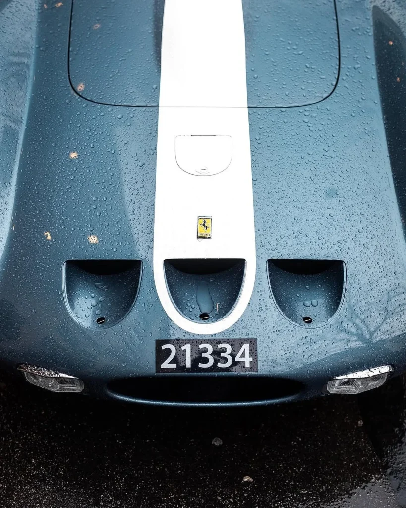 A street photo of a Ferrari supercar sparked chaos online after viewers realized the drenched coupe in the frame wasn’t nearly as ordinary as it seemed