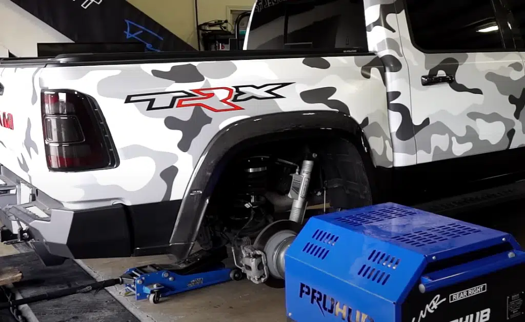 Watch a tuned Ram 1500 TRX beat a Lamborghini Huracan in a drag race. This 1,350hp truck proves raw power can rival Italian precision