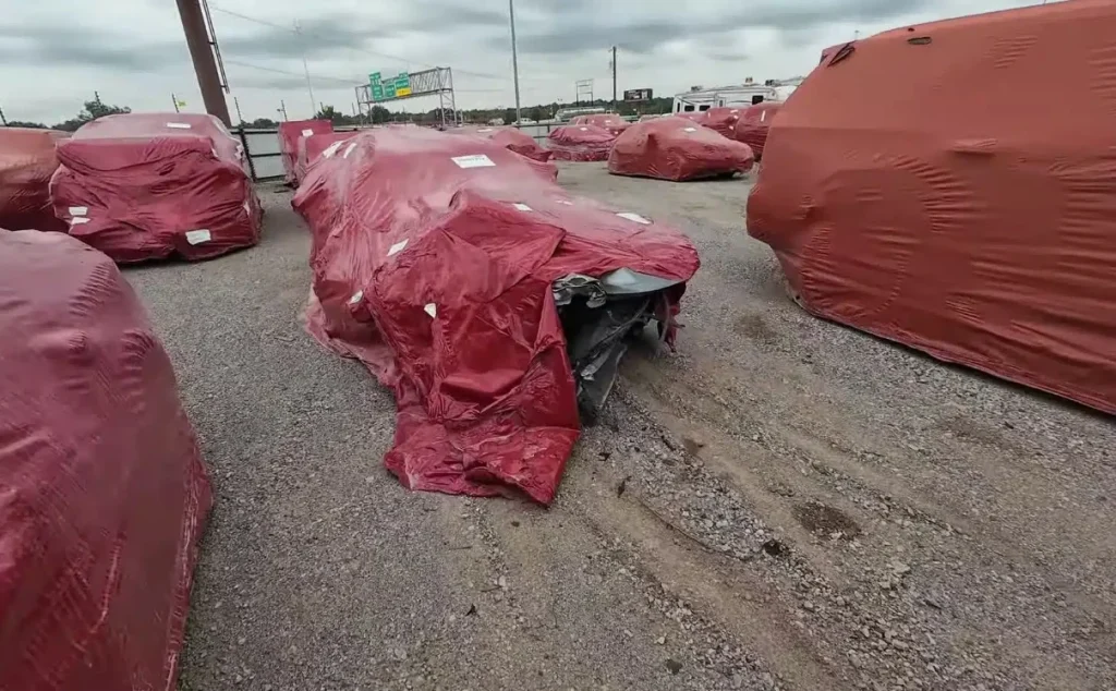 A YouTuber found a car graveyard in Oklahoma packed with cars wrapped in red plastic bags that look a little strange but are extremely important