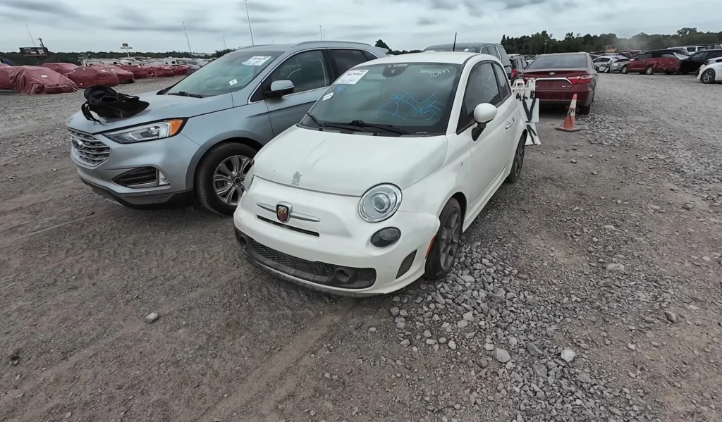 A YouTuber found a car graveyard in Oklahoma packed with cars wrapped in red plastic bags that look a little strange but are extremely important