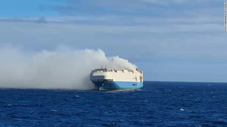 A cargo ship full of Porsches is on fire in the middle of the ocean