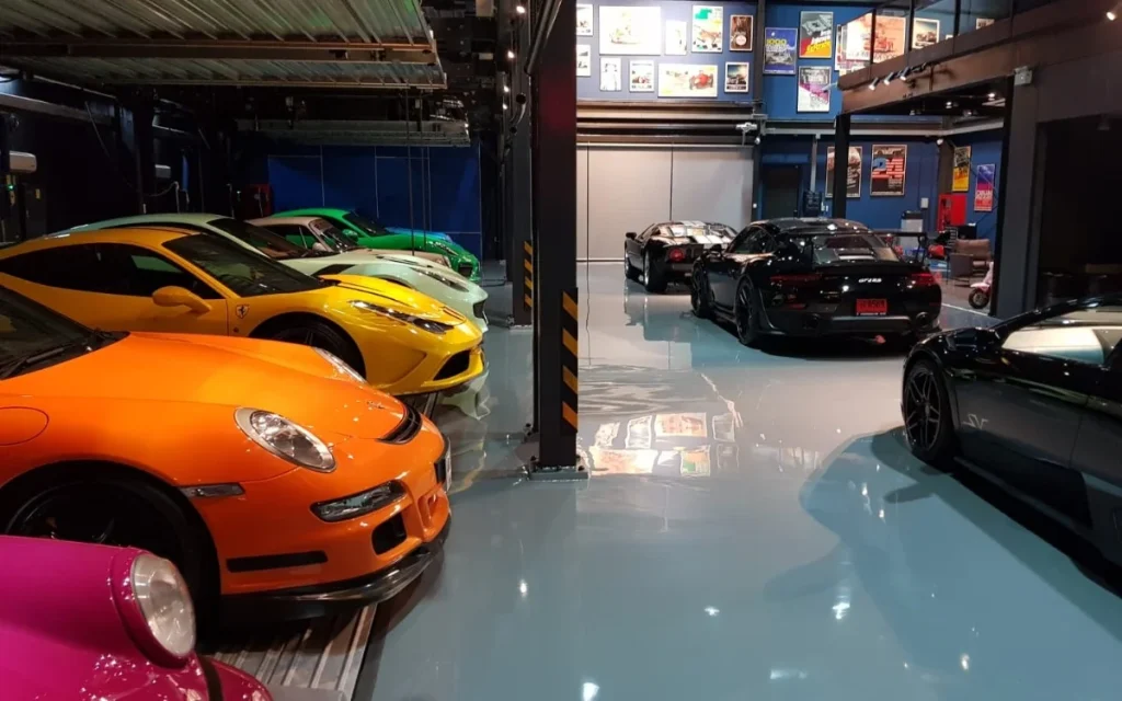 A Porsche lover and real estate developer in Thailand showed his entire car collection to Supercar Blondie - aka Alex Hirschi - and it's quite something