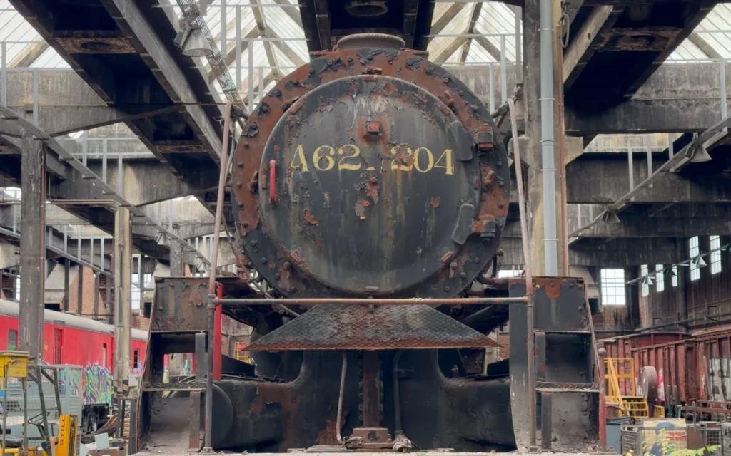 Explorers find hundreds of rotting trains in abandoned warehouse and many are holding dark secrets