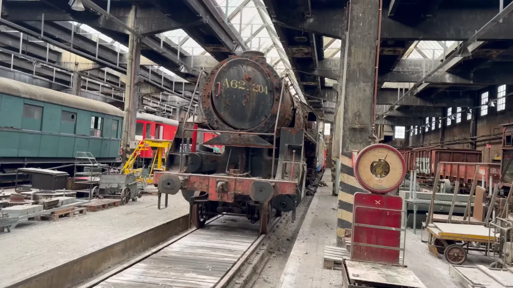 Explorers find hundreds of rotting trains in abandoned warehouse and many are holding dark secrets