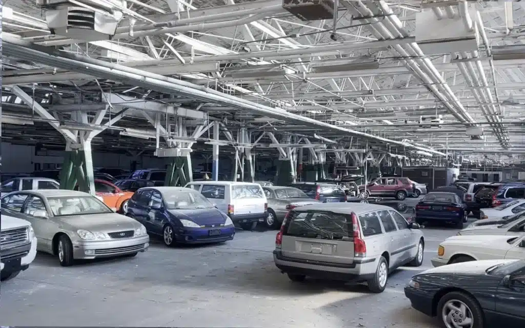This abandoned dealership in Chicago is hiding a million dollars worth of cars, including some rare bodies from Mercedes, Porsche, and Jaguar