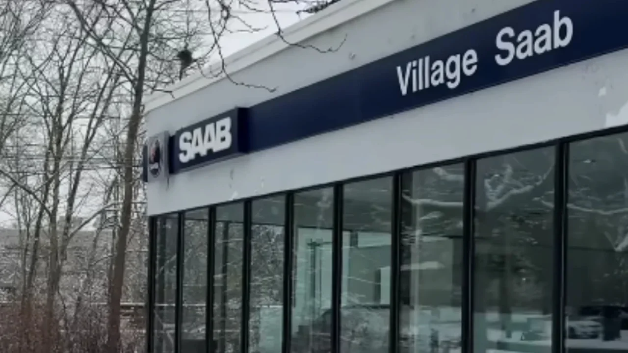 Woman exploring abandoned Massachusetts Saab dealership that's been closed for years and discovers a car that’s left everyone stumped