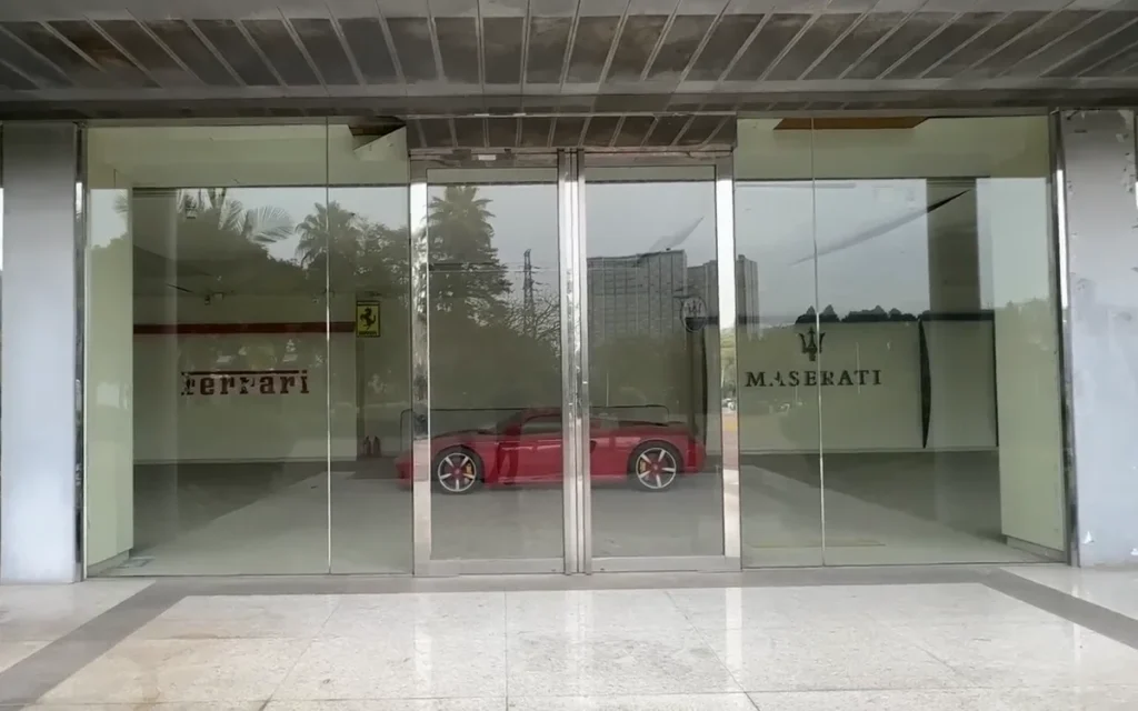 An abandoned supercar dealership in China, hiding models from Ferrari, Chevrolet, and Porsche, left this Los Angeles man completely baffled