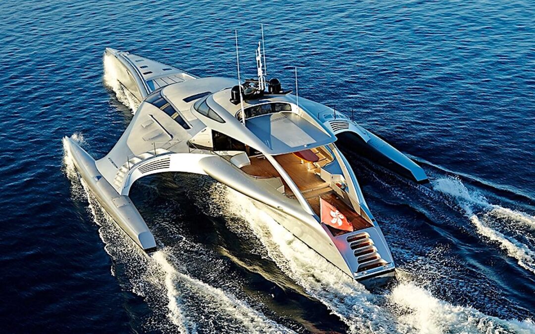 This $10m yacht has three hulls and can travel half way around the globe on a single tank