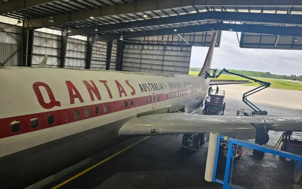 After rotting away in an abandoned hangar this Qantas Boeing 707 once owned by John Travolta is about to be brought back to life tail