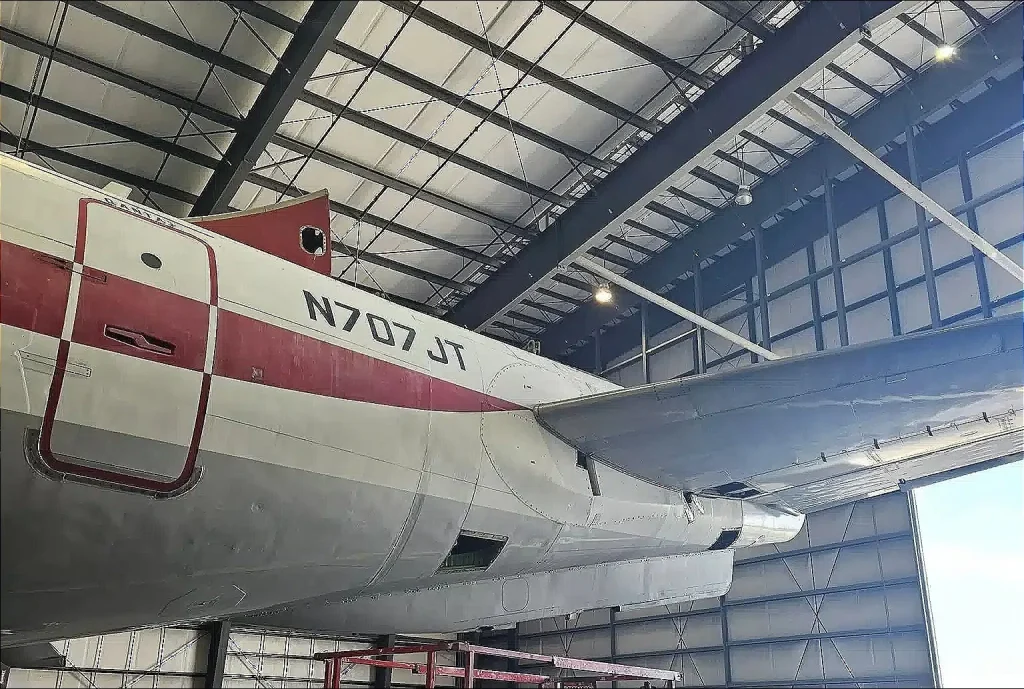 After rotting away in an abandoned hangar this Qantas Boeing 707 once owned by John Travolta is about to be brought back to life tail