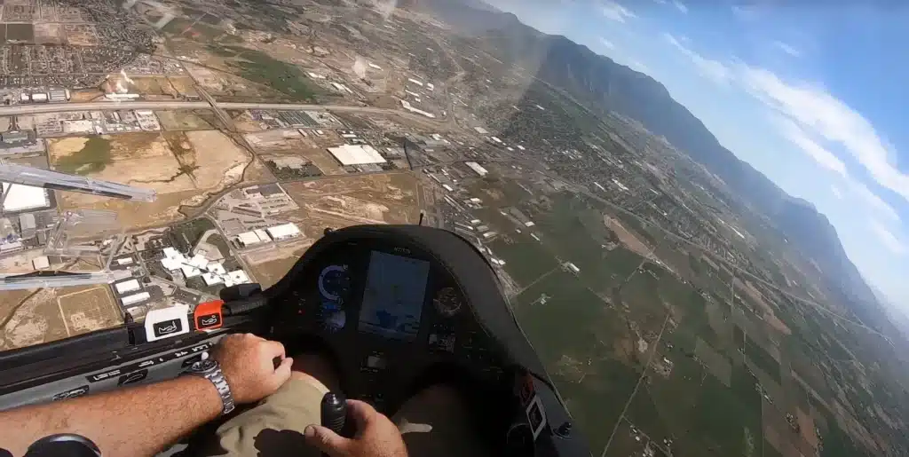 Glider pilot does unplanned air show performance and wows crowd but ends up losing his license