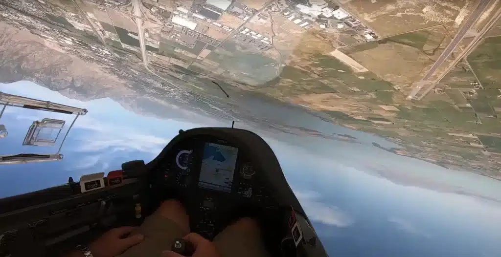 Glider pilot does unplanned air show performance and wows crowd but ends up losing his license