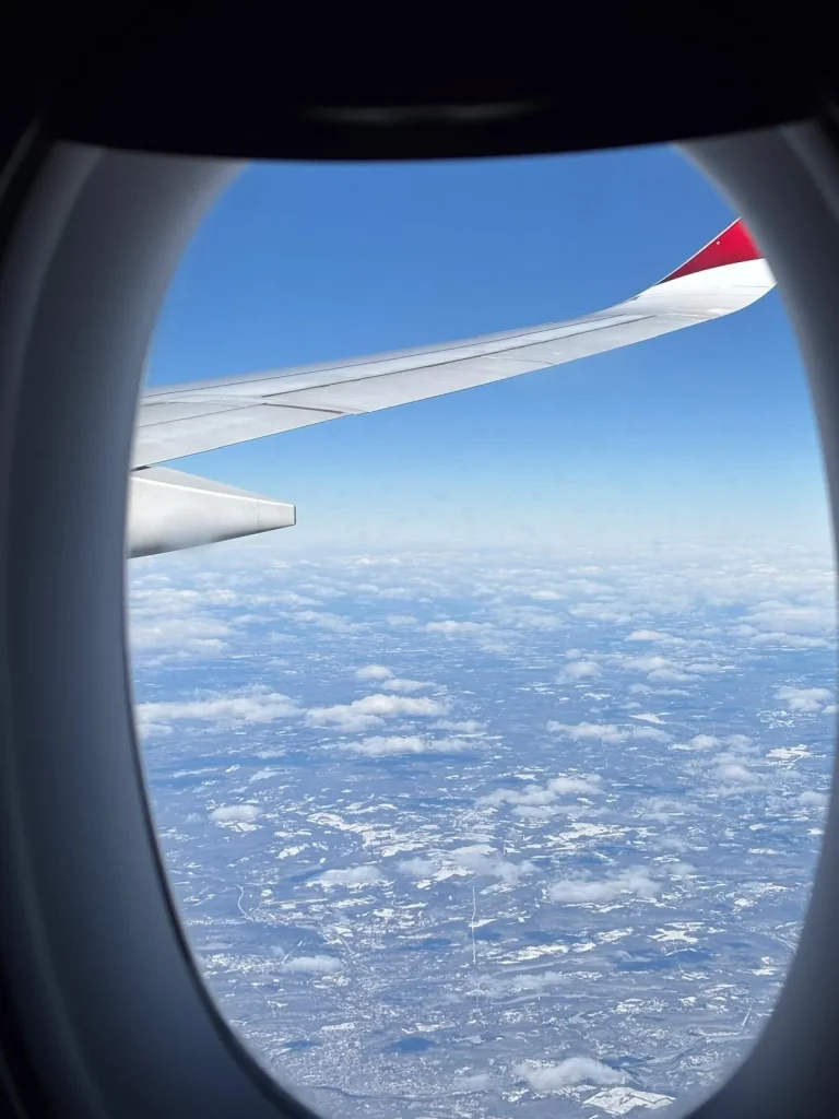 Why does every airplane window have a tiny hole in it?