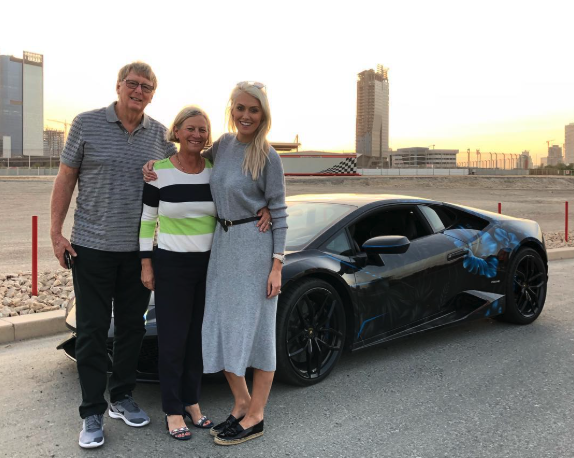 Alex Hirschi with her mom and dad, Julie and Richard Darvall