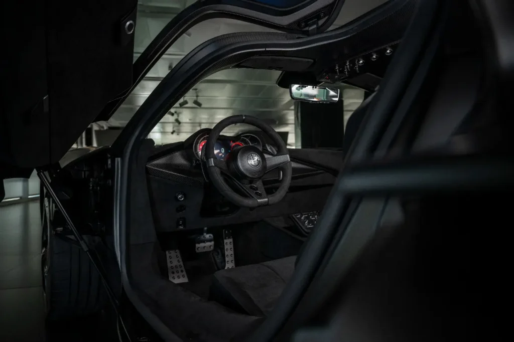 Alfa Romeo unveils 2026 33 Stradale Perla Nera, a one-off blacked out carbon fiber version of its ultra-limited supercar
