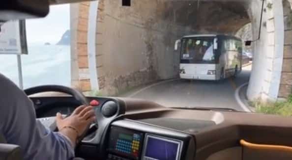 A bus in a narrow tunnel on the Amalfi Coast, Italy.